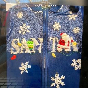 All Points by Reference Point woman’s gently worn Santa sweater.